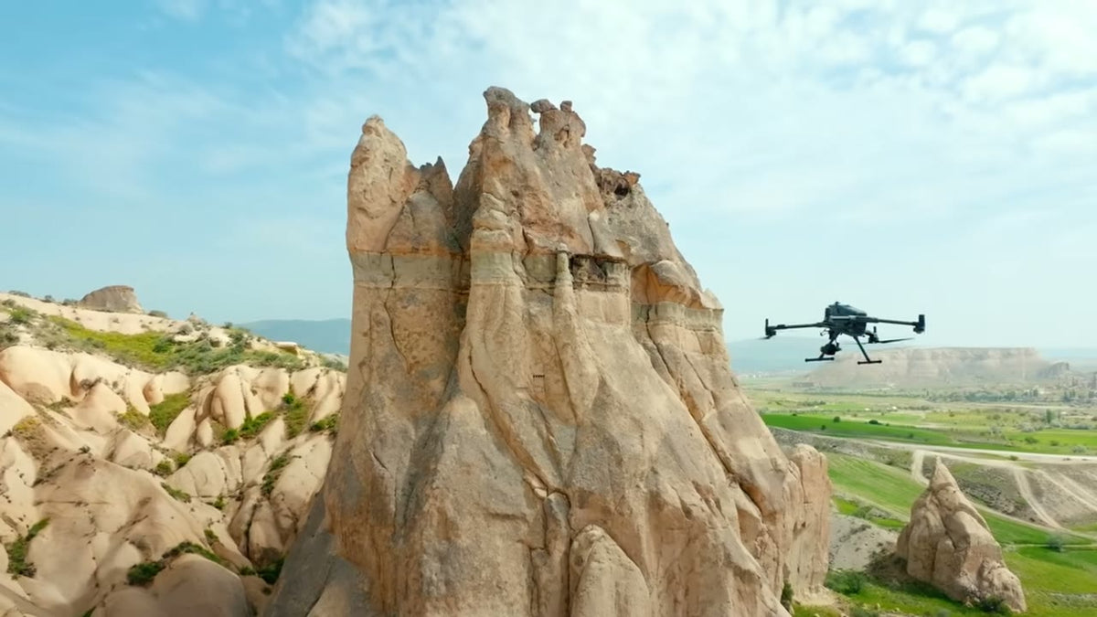 DJI Matrice 400 flying beside rock formations in Cappadocia