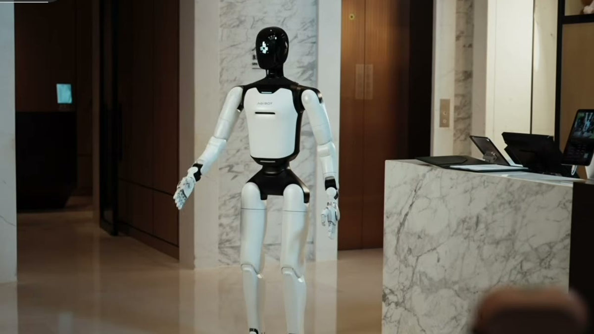 AgiBot A3 Ultra walking a hotel lobby