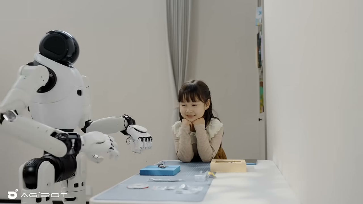 AgiBot X2 humanoid with OmniHand dexterous hands playing a board game with a child