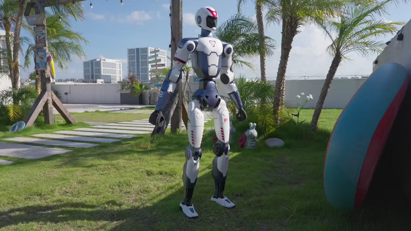 Unitree R1 humanoid robot standing back up after a fall