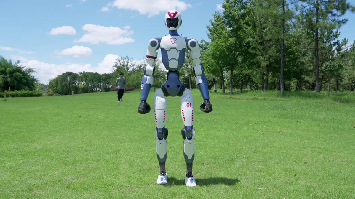 Load video: Unitree R1 humanoid robot doing a handstand on grass