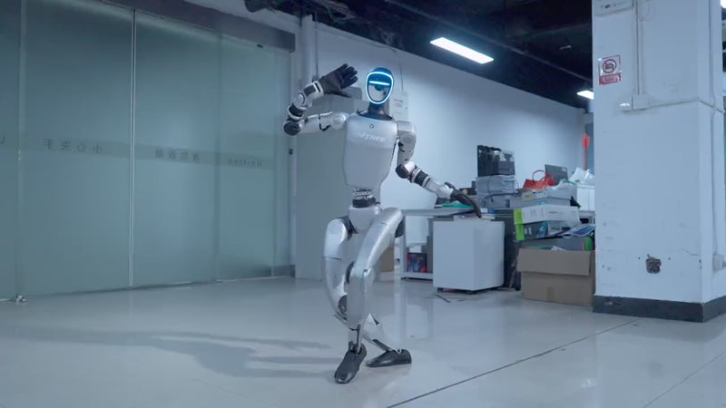 Unitree G1 humanoid robot performing a full body motion routine indoors