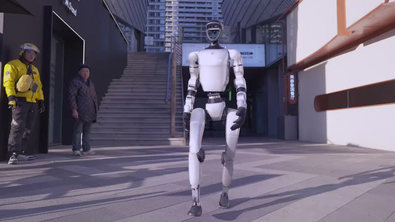Unitree G1 humanoid robot walking through a city street