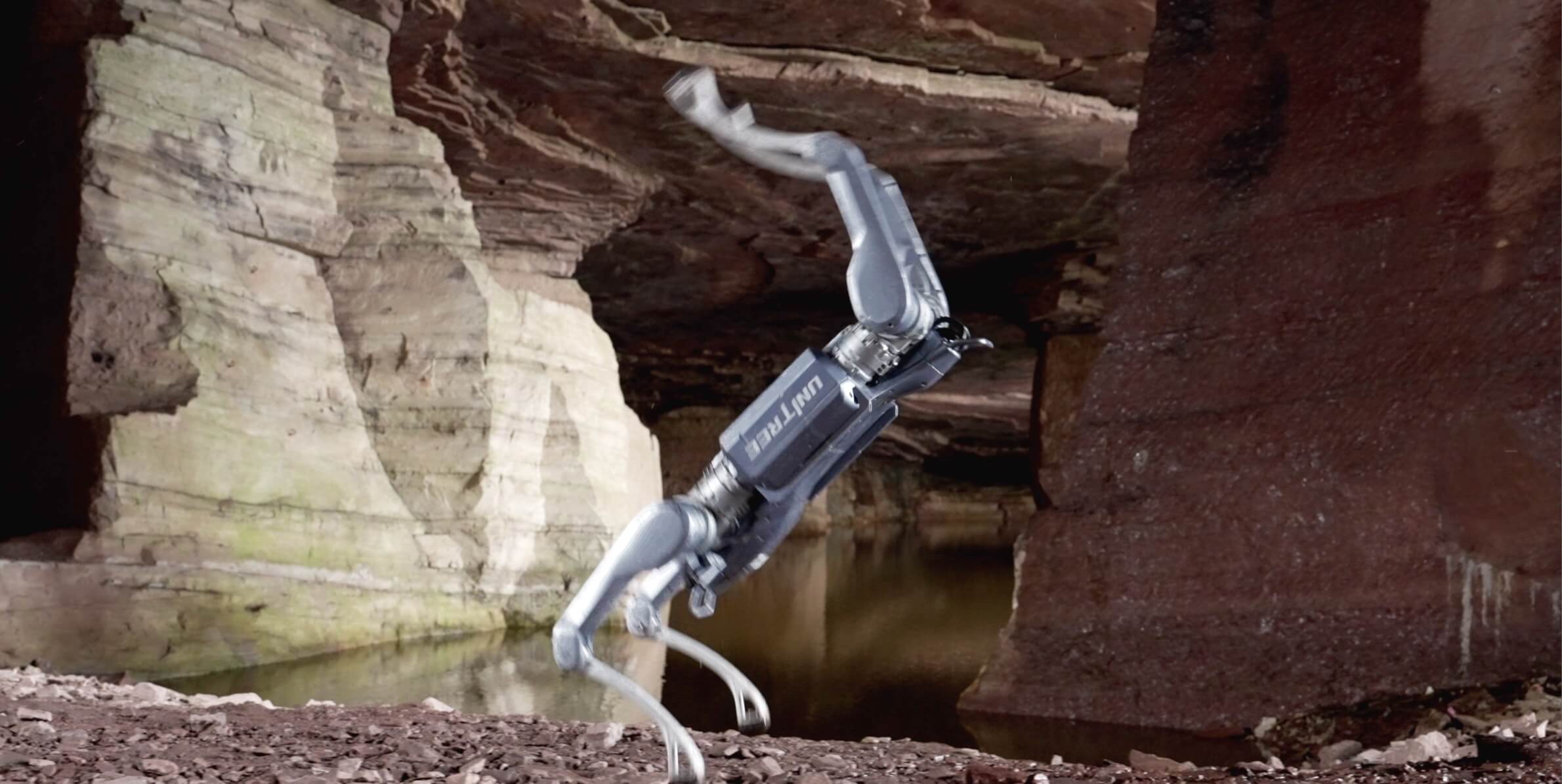 Unitree A2 quadruped robot inspecting a dark cave environment