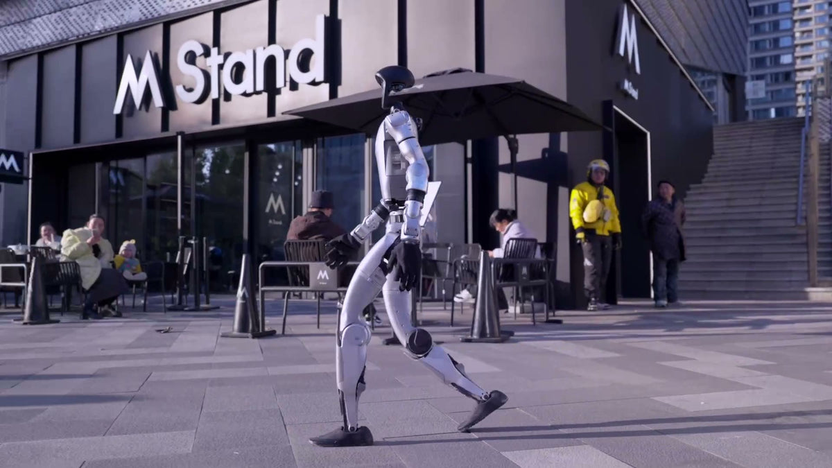 Unitree G1 humanoid robot walking on a city street