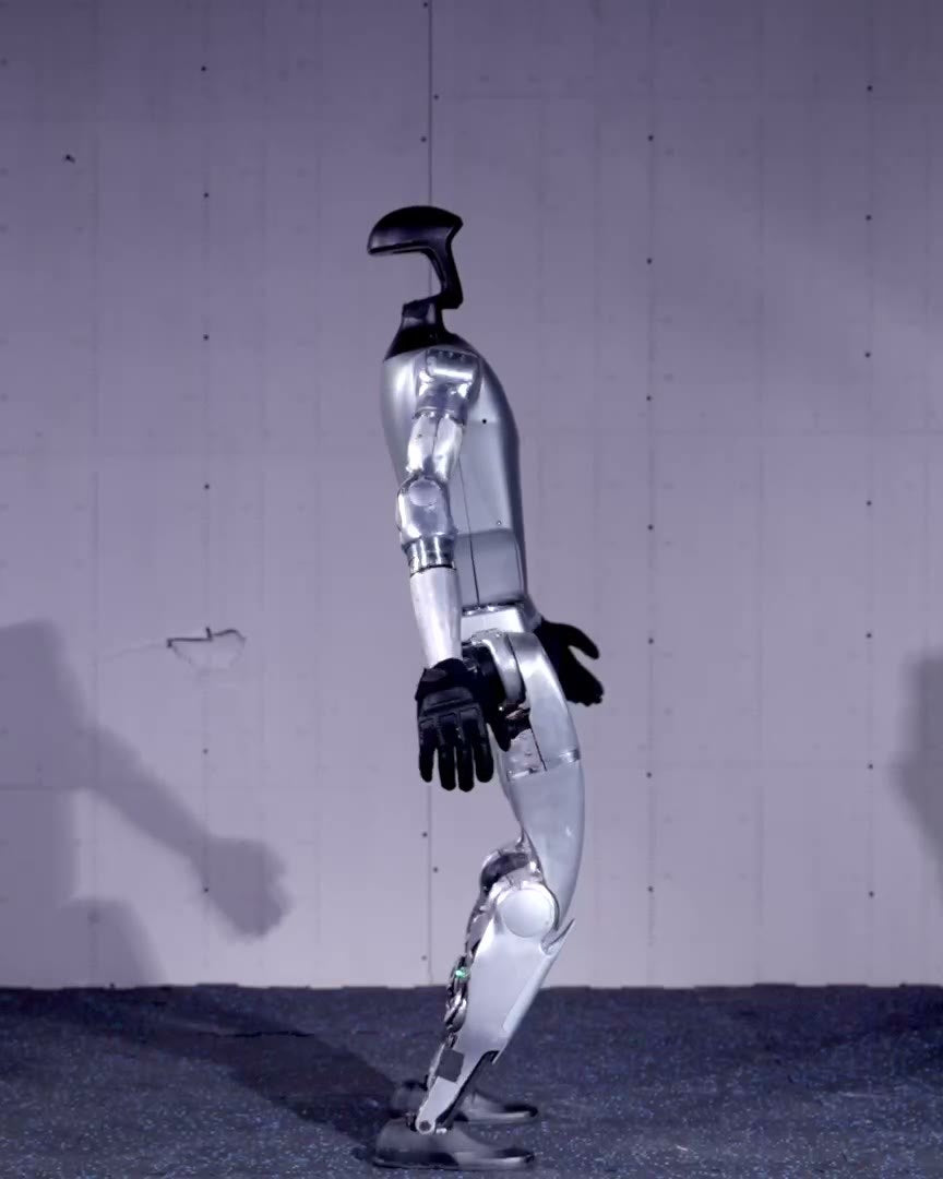 Unitree G1 humanoid robot moving against a concrete wall