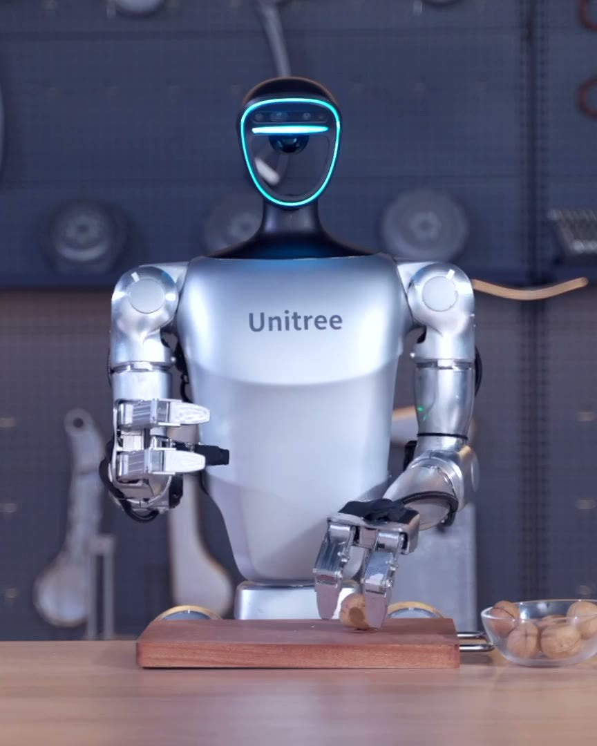 Unitree G1 humanoid robot at a tool workbench